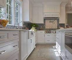 When choosing your cabinets, go with a cream or white base. Modern Farmhouse Kitchen Style Craig Allen Designs Craig Allen Designs