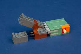 To make a pickaxe you need sticks. Lego Minecraft Big Figs Series 1 21148 Steve With Parrot 21149 Alex With Chicken And 21150 Skeleton With Magma Cube Review The Brothers Brick The Brothers Brick