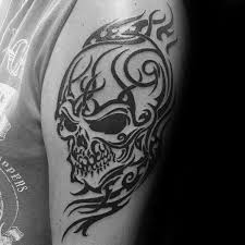 50 Tribal Skull Tattoos For Men Masculine Design Ideas Tribal Skull Tattoos For Guys Pirate Skull Tattoos