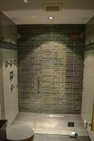 Explore sinks, bathtubs, and showers, creative tile designs, and a variety of counter and flooring ideas. Glass Tile Shower Glass Tile Custom Bathroom Lakeview Modern Bathroom Tile Simple Bathroom Remodel Glass Tile Bathroom