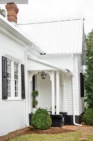I'm thinking of putting a metal roof on my house and i dont know which color would be more efficient as far as keeping the house cool white or silver? City Chic Country Calm Atlanta Homes And Lifestyles