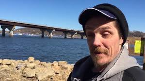 Man rescued from ice floating