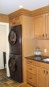 Whether you have a small laundry closet, a stacked washer and dryer, or a laundry area in the basement—these tips will improve your laundry room organization. Birmingham Laundry Room Innovative Designs Beautiful Stacked Washer And Dryer