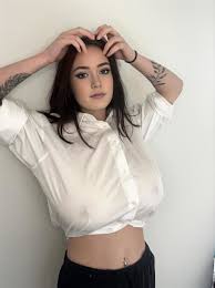 Adorable blue eyed teen with huge juggs Brooke Mills poses in a tight shirt  - pornpic.com