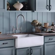From washing dishes and utensils to filling pots for cooking, it's a piece designed to take on a full workload. Kohler Farmhouse Sink And Faucet Kitchen Cabinetry New Kitchen Kitchen Design