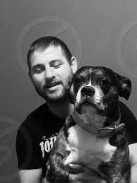 They are often used as hunting dogs for their keen sense of smell and agility. Man Carrying Black And White Short Haired Large Dog By Jaime Ambrose Photo Stock Snapwire