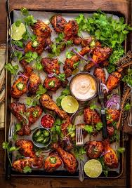 Traeger Grills Smoked Chicken Tikka Drumsticks In 2020 Food Platters Indian Food Recipes Party Food Platters