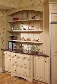 The frame of the display cabinet is made out of rustic reclaimed wood with a distressed finish and has four tiers of shelves which give it a lot of room. Curio Cabinet
