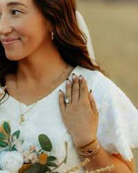 Happy Saturday Spotlight featuring the beautiful @saigejensengiles! --  Saige and her husband had a beautiful December wedding and got sealed in  the Logan Utah Temple. She is wearing our Raegan gown which