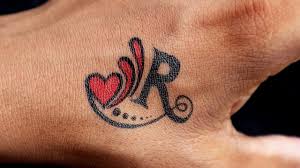 By choosing to get across with the person's name and maybe with hands folded in prayer, you are trying to express that you are in constant prayer, for your loved one, to reach the gates of heaven safely. How To Make R Letter Tattoo Designs Temporary Tattoo Of R Letter Make At Home With Pen Youtube