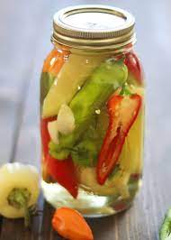 Add enough olive oil to cover the peppers (and, if you want, a little salt for seasoning). How To Make Pickled Peppers