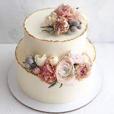 Delicate Pastel Fresh Flowers On Top Of A Simple Two Tier Cake With Hand Painted Gold Trim Wed Spring Wedding Cake Pretty Wedding Cakes Simple Wedding Cake