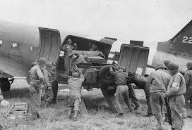 Unloading a Jeep from a C-47 – WW2 Images