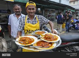 2 roti canai + telur mata half cook + kari ayam + teh tarik jumlah rm5.00. Transfer Road Roti Image Photo Free Trial Bigstock
