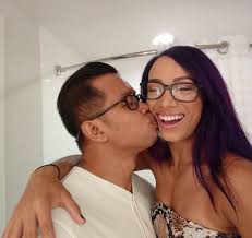 Wwe Superstar Sasha Banks Mercedes Varnado Ton Getting A Kiss From Her Husband Sarath Ton Sarath Occasionally Wwe Couples Raw Women S Champion Cute Couples