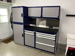 .of this garage finishing project included purchasing, assembling and installing storage cabinets. Home Garage Rousseau Metal Rousseau Automotive International