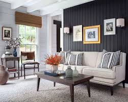 Closeup of grey block wall. 28 Gorgeous Living Rooms With Black Walls That Create Cozy Drama