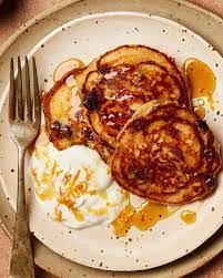 Yotam Ottolenghi On Instagram Ricotta And Feta Pancakes With Orange Soaked Sultanas In Guardian Bio Link For Christmas Br Food Bio Food Christmas Breakfast