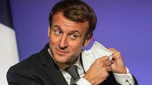 Macron ties French vaccine passports to booster shots