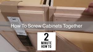 The first step in how to install kitchen cabinets is finding the highest point on the floor. How To Screw Cabinets Together Simple Easy Youtube