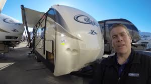 Communal outdoor fire pit and covered entertainment/outdoor kitchen area close by. 2017 Keystone Cougar X Lite 21 Rbs Travel Trailer With King Size Bed Youtube