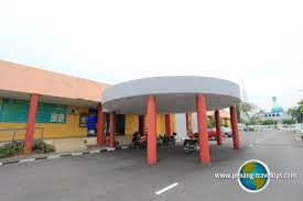 A motorist rides past the vaccine administration centre banner in seberang perai arena, seberang jaya april 2, 2021. Seberang Jaya Swimming Pool