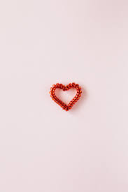 Macox, linux, windows, android, ios and many others. Red Heart Made Of Coil Hair Tie On Pink Background Free Stock Photo