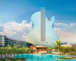 The World S First Guitar Shaped Hotel Will Open In South Florida The 1 5 Billion Hard Rock Property In Hollywood For Florida Hard Pool Pool Float Rooftop Bar