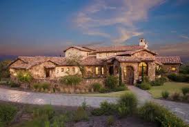 Like the flat dark wood surface on the opened up wall section. The History And Architecture Of Hacienda Style Homes