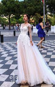 A Line Wedding Dress With Transparent Long Sleeves Is The Perfect Combination Of Tradition And Romanc Unique Wedding Gowns A Line Wedding Dress Wedding Dresses
