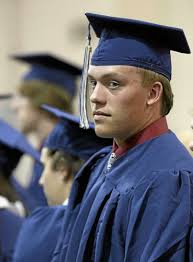 Graduates in tornado-raked Okla. town vow to stay