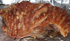 Place pork shoulder on a rack in a roasting pan. Slow Roast Shoulder Of Pork