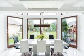 And they look so much better! Spacious Dining Room Interior With Big Window Stock Photo Picture And Royalty Free Image Image 42425510