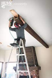 Hewn Elements Diy Ceiling Beam Install Diy Ceiling Faux Ceiling Beams Diy Home Crafts