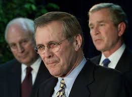 A photo of donald rumsfeld shaking saddam's hand on dec. 9kkl Th1ve 7wm