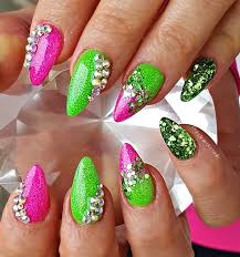 In the modern fashion world, black often represents stability or conservatism, because it is worn to work or on serious occasions. Neon Pink And Green Acrylic Nails Acrylicnails Neonnails Green Acrylic Nails Almond Nails Pink Green Nail Designs