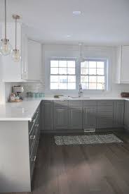 Installing A Subway Tile Backsplash In Our Kitchen White Kitchen Makeover White Ikea Kitchen Classic Kitchen Design