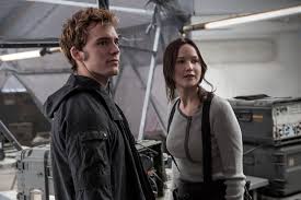 Her name comes from a plant with edible tubers called sagittaria (katniss), from sagittarius the archer, whose name means he that throws arrows in latin. Mj2 Stills 2 Panem Propaganda