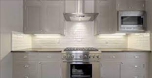 An advertising office in athens has been transformed into a minimalist, geometric, colourful composition by darchstudio. Amazing Gray Kitchen With Gray Kitchen Cabinets With Honed Absolute Black Granite Countertops And Subway Ti Grey Kitchen Cabinets Grey Kitchen Kitchen Cabinets