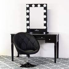 With a single front tiltable mirror, with 3 mirrors small, and 3 black vanity tables with mirror between $100 and $200 dollars. Classic Black Vanity Table With Power Outlets