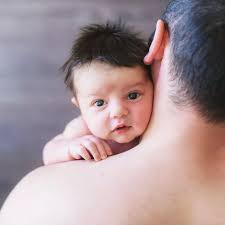 Dads' brains shrink when their baby is born, making them more empathetic