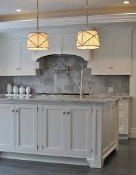 White kitchen with grey marble countertops. Kitchen With Gray Marble Backsplash Transitional Kitchen