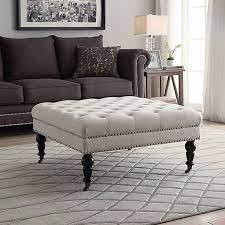 The ottoman is upholstered in fine fabric and completed with button tufting. Linon Home Isabelle Square Tufted Ottoman Bed Bath Beyond