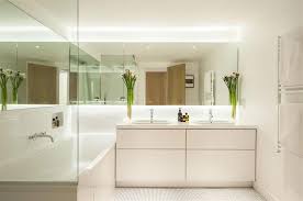 Not only do large mirrors transform a… you might be wondering how a large bathroom mirror can give your bathroom a facelift. Large Bathroom Mirrors Wall Strangetowne Cozy And Elegant Bathroom With Large Bathroom Mirrors