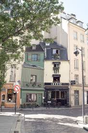 Odette Paris A Cute Pastry Shop In The Latin Quarter Of Paris 5th Arrondissement Serves Delicious Traditional Choux P Paris Shopping Parisian Cafe Parisian