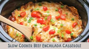 In a large skillet, brown the ground beef with garlic salt and onion powder; Slow Cooker Beef Enchilada Casserole The Magical Slow Cooker