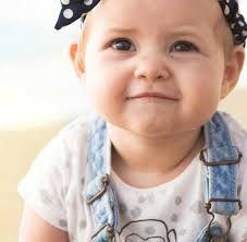 Early intervention programs to assist children with hearing loss develop  spoken language.