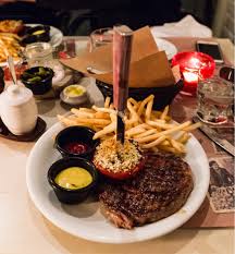 Creamy bearnaise rib eye steak. Bouchon Bistro Francais Retty