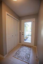 The only thing i knew for sure when we began fixing it up was our paint colors. Sherwin Williams Mindful Gray Paint In Entry Transitional Entry Grand Rapids By At Home Design And Staging Houzz Au
