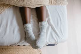 Sleeping with Socks: Harmful or Helpful? | The Output by Peloton